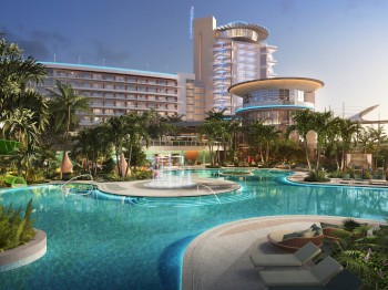 The image shows a luxurious resort with a large, beautifully designed swimming pool, surrounded by lush palm trees and modern architecture.